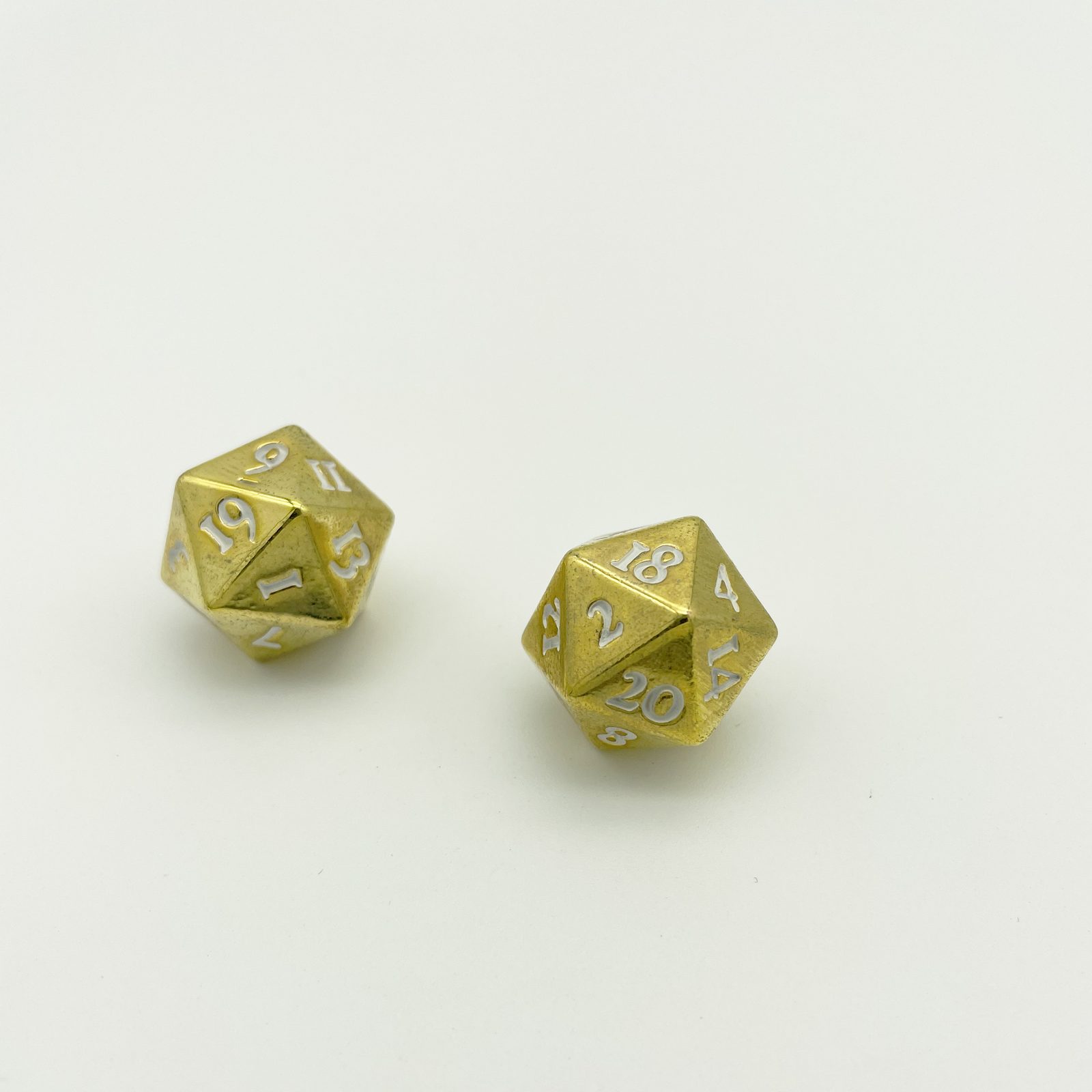 Custom metal polyhedral dice, bright plated faces