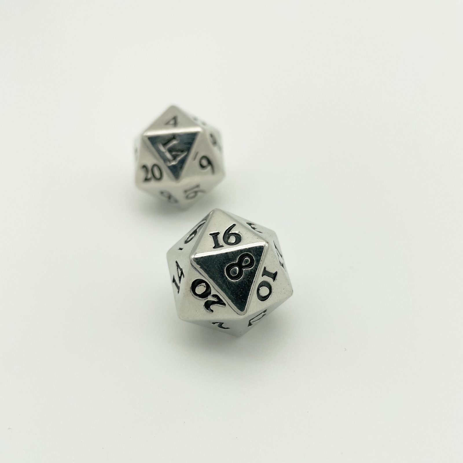 Custom metal polyhedral dice set piece, multi-tone plating