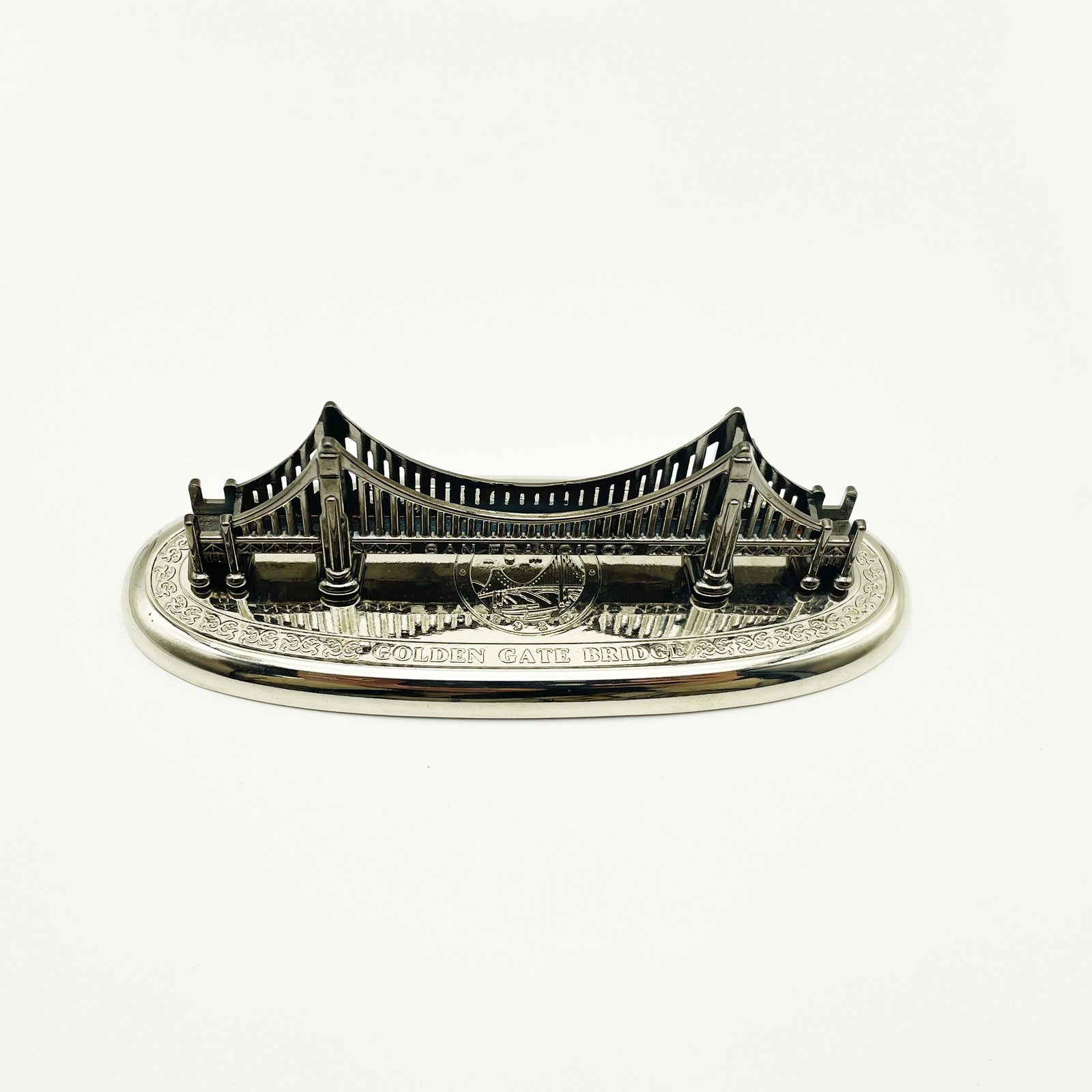 Custom GOLD BRIDGE game token front view, plated finish